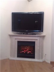 Камины фото. Угловые камины.