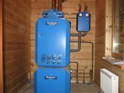 Установка электро,  твердотопливных котлов отопления