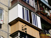 Вынос балконов. Сварочные работы. Обшивка,  утепление,  остекление